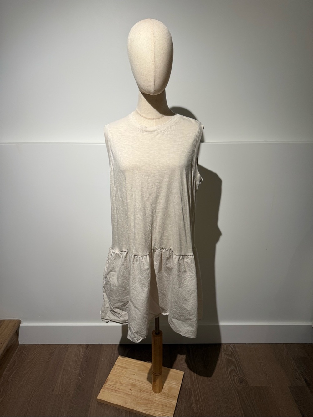 Sleeveless Cream Ruffle-Hem Women's Top